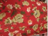 POPELIN FLORES FONDO ROJO